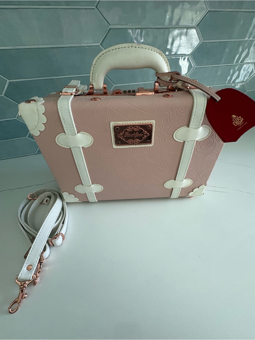 Cotrunkage SarahFace Train Case Pink Embossed Trunk Bag Crossbody Mark Cross Tag